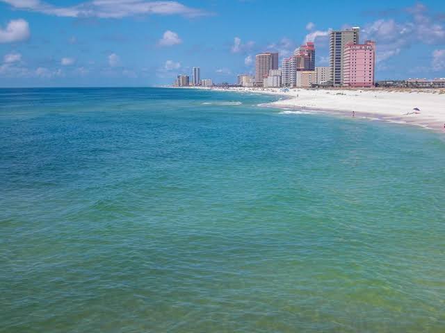 The impossibly white sand and emerald waters of Gulf Shores, Alabama